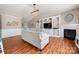 Comfortable living room with built-in shelving, a fireplace, and a neutral-toned sofa at 114 Nevis Ln, Mooresville, NC 28115