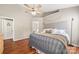 Spacious main bedroom with vaulted ceilings, natural light, and a calming color palette, perfect for rest and relaxation at 114 Nevis Ln, Mooresville, NC 28115