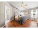 Cozy main bedroom featuring vaulted ceilings, a ceiling fan, and neutral decor, creating a peaceful and relaxing retreat at 114 Nevis Ln, Mooresville, NC 28115