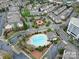 Attractive aerial view of the community with pool, landscaping, and well-maintained buildings at 11530 Costigan Ln, Charlotte, NC 28277