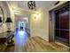 Hallway of building with trim, an elevator and a decorative mirror on an entry table at 11530 Costigan Ln, Charlotte, NC 28277