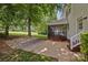 Screened porch with an expansive backyard and rock landscaping at 11909 Cupworth Ct, Huntersville, NC 28078