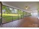 Screened porch with golf course views at 11909 Cupworth Ct, Huntersville, NC 28078
