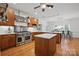 Bright kitchen with wooden cabinets, white countertops, stainless steel appliances at 12900 Westmoreland Rd, Huntersville, NC 28078