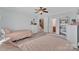 Bedroom with two twin beds and view of staircase at 13056 Long Common Pkwy, Huntersville, NC 28078