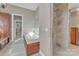Neutral main bathroom featuring a large shower, soaking tub, and plenty of vanity space at 13056 Long Common Pkwy, Huntersville, NC 28078