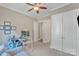 Bright home office with neutral walls and carpet at 13056 Long Common Pkwy, Huntersville, NC 28078