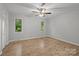 Large bedroom featuring ample space and natural light at 13446 Idlefield Ln, Matthews, NC 28105