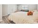 Bedroom with calming colors, a calming rug, and walk in closet at 136 Gable Rd, Mooresville, NC 28115