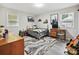 Cozy bedroom with natural light, wood-look flooring, and a comfortable space at 136 Gable Rd, Mooresville, NC 28115