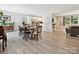 Bright and airy dining room seamlessly connects to the kitchen, promoting Gathering connection at 136 Gable Rd, Mooresville, NC 28115