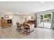 Open-concept dining room with sliding doors to the patio, ideal for outdoor entertaining at 136 Gable Rd, Mooresville, NC 28115
