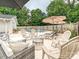 Inviting patio area with ample seating, perfect for entertaining and enjoying outdoor living near the pool at 136 Gable Rd, Mooresville, NC 28115