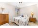 Relaxing bedroom features a queen-sized bed with floral bedding, side tables, and natural light at 13830 Riding Hill Ave, Charlotte, NC 28213