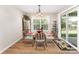 Charming dining area featuring a glass-top table and stylish chairs at 13830 Riding Hill Ave, Charlotte, NC 28213