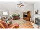 Bright living room with vaulted ceilings, fireplace, and comfortable seating at 13830 Riding Hill Ave, Charlotte, NC 28213