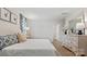 Bright bedroom featuring a bed, decor, neutral walls, and lots of light at 15031 Milo Ln, Charlotte, NC 28278