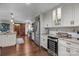 Stylish kitchen with a large island, stainless steel appliances, and a wine cooler for modern living at 1515 Heatherloch Dr, Gastonia, NC 28054