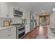 Well-equipped kitchen featuring stainless steel appliances, granite countertops, and custom cabinetry at 1515 Heatherloch Dr, Gastonia, NC 28054