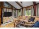 Bright living room with vaulted ceilings, large windows, and comfortable sectional sofa at 1515 Heatherloch Dr, Gastonia, NC 28054
