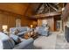 Open living room features hardwood floors, fireplace, and comfortable seating at 1515 Heatherloch Dr, Gastonia, NC 28054