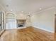 Open living room with built in shelves surrounding the fireplace at 1522 High St, Charlotte, NC 28211