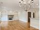 Open living area featuring hardwood floors, fireplace and built-in shelving at 1522 High St, Charlotte, NC 28211