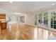 Bright living room features hardwood floors and glass doors leading to outdoor space at 1522 High St, Charlotte, NC 28211