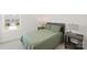 Cozy bedroom with a window view and featuring neutral carpet and furniture at 1563 Old Rivers Rd, Concord, NC 28027