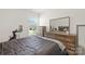 Bedroom featuring wood furniture, a window, and exercise equipment at 1563 Old Rivers Rd, Concord, NC 28027