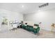 Upstairs bonus room with desk and chair, providing a versatile living space at 1563 Old Rivers Rd, Concord, NC 28027
