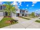 Well-maintained townhomes with individual garages and landscaped yards at 1563 Old Rivers Rd, Concord, NC 28027