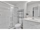 Clean bathroom with a tiled shower and a vanity, ideal for relaxation at 16039 Simril Ct, Charlotte, NC 28278