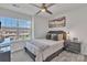 Cozy bedroom features neutral tones, plush bedding, and a view of the neighborhood at 16039 Simril Ct, Charlotte, NC 28278