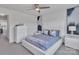 Spacious bedroom with a ceiling fan, bright light, and modern furnishings at 16039 Simril Ct, Charlotte, NC 28278