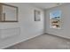 Simple bedroom features neutral carpet and a window with neighborhood view at 16039 Simril Ct, Charlotte, NC 28278
