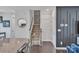 Inviting entryway with a granite countertop, stairs, and an open layout at 16039 Simril Ct, Charlotte, NC 28278