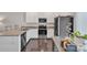 Well-equipped kitchen featuring stainless steel appliances and granite countertops at 16039 Simril Ct, Charlotte, NC 28278