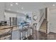 Well-lit kitchen featuring modern appliances, granite countertops, and barstool seating at 16039 Simril Ct, Charlotte, NC 28278