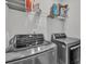 Efficient laundry room with modern appliances and ample shelving for storage at 16039 Simril Ct, Charlotte, NC 28278