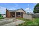 Backyard view of brick home featuring a patio area and shed for storage at 1609 Mcfarland Dr, Shelby, NC 28152