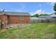 This home features a spacious backyard, patio and fence with plenty of room for outdoor activities at 1609 Mcfarland Dr, Shelby, NC 28152