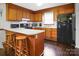 Functional kitchen equipped with updated appliances, counter seating and plenty of storage at 1609 Mcfarland Dr, Shelby, NC 28152