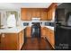 Contemporary kitchen features a complete appliance suite and ample counter space for cooking at 1609 Mcfarland Dr, Shelby, NC 28152