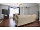 Bright living room showcasing hardwood floors and comfortable seating at 1609 Mcfarland Dr, Shelby, NC 28152