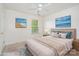 Cozy bedroom with neutral decor, plush bedding, and serene artwork at 2013 Arbor Crest Ct, Charlotte, NC 28262