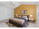 Inviting bedroom with a king-size bed, ceiling fan, and stylish decor at 2013 Arbor Crest Ct, Charlotte, NC 28262