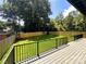 A spacious backyard featuring a well-maintained lawn and a wooden fence for privacy at 2414 E 7Th St, Charlotte, NC 28204