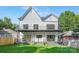 Back exterior elevation of the modern two story home, with dual balconies at 2414 E 7Th St, Charlotte, NC 28204