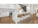 Stylish kitchen featuring a large island with bar seating, hardwood floors, and modern finishes at 2414 E 7Th St, Charlotte, NC 28204